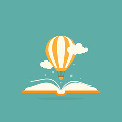 Open book with air balloon and clouds. isolated on turquoise background.