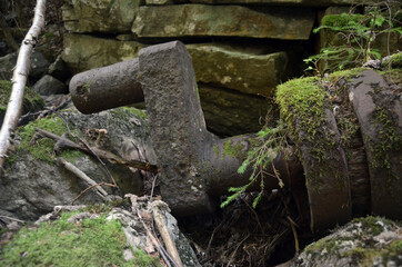 Ruins of an old mill covered with wood. Norway