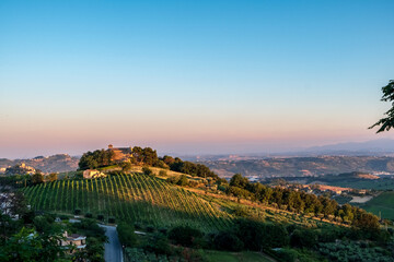 Beautiful sunset on the countryside of Marche in a summer evening