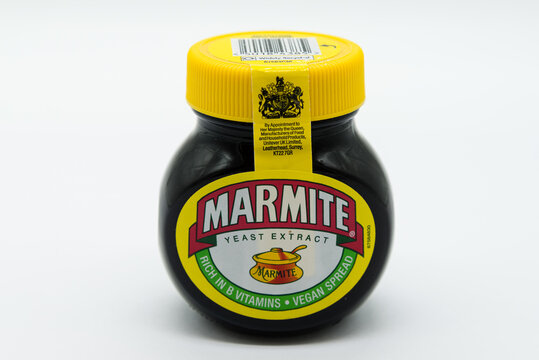 Irvine, Scotland, UK - August 08, 2020: Marmite Branded Yeast Extract In Recyclable Glass Jar And Recyclable Plastic Lid.