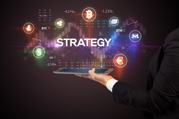 Close-up of a touchscreen with STRATEGY inscription, business opportunity concept