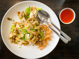 Fried rice noodle with chicken ready to eat on the table