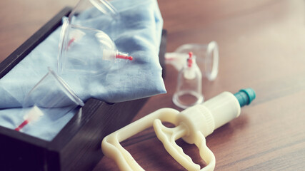 Vacuum therapy. Cup massage. Hijama. traditional Chinese medicine clinic indoor. medical and health concept.