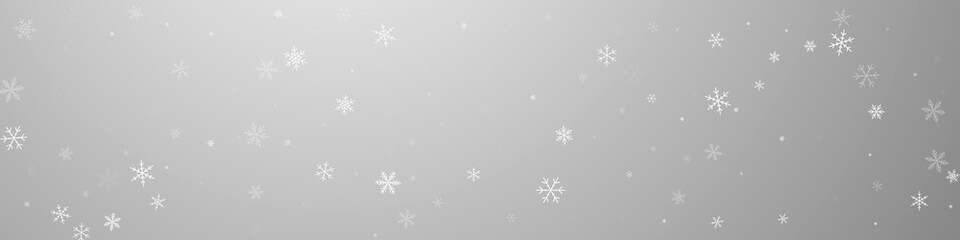 Sparse snowfall Christmas background. Subtle flyin