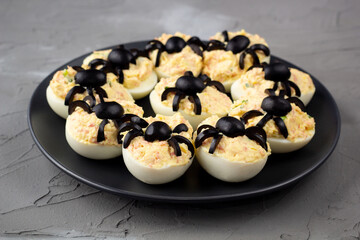 Deviled Eggs With A Spider For Halloween Party.