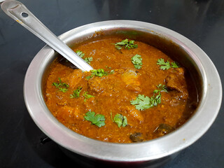 Indian Chicken Curry with coriander leaves.