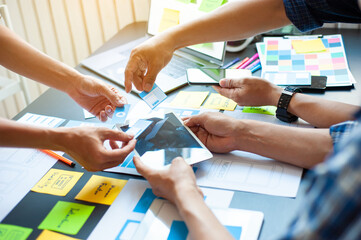 Designers brainstorm for designing websites and mobile apps.