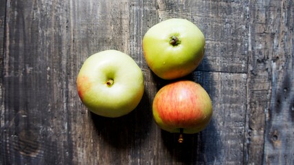 apples on wooden table