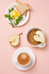 healthy breakfast on a pink background.