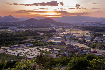 Beautiful landscape panoramic view of county side background curious clouds.