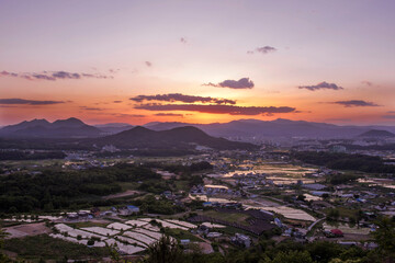 Beautiful landscape panoramic view of county side background curious clouds.