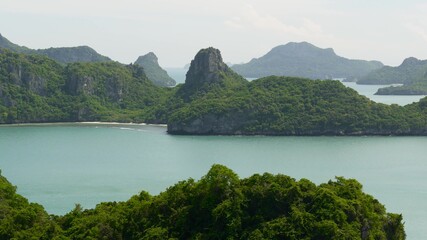 Bird eye panoramic aerial top view of Islands in ocean at Ang Thong National Marine Park near touristic Samui paradise tropical resort. Archipelago in the Gulf of Thailand. Idyllic natural background