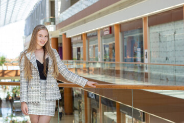 Portrait of successful beautiful woman in modern office, business center