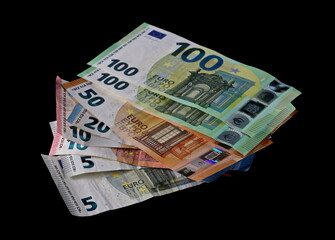 Euro paper cash money, banknotes, bills isolated on black background with clipping path