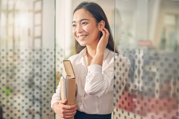 Charming international female person being in the office