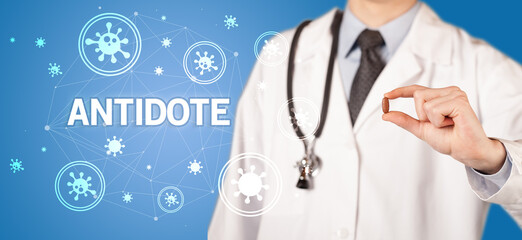 Doctor giving pill with ANTIDOTE inscription, coronavirus concept