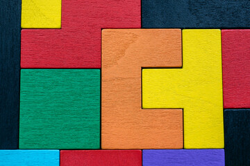 Colored wooden blocks. Puzzle, mind game and toy