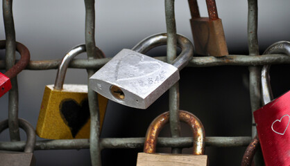  Love padlocks with heart close-up picture on the Hohenzollern Bridge in Cologne, Germani. 