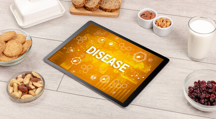 Healthy Tablet Pc compostion with DISEASE inscription, immune system boost concept
