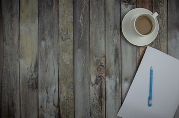 coffee cup on wooden background