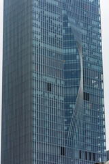Fototapeta premium SHENZHEN, CHINA, 02 JANUARY 2020: The twisted skyscraper of Shenzhen business district, symbol of environmental sustainability