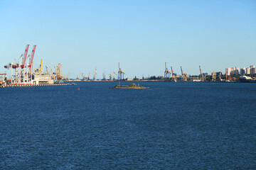 Сommercial port harbor landscape. Industrial seascape. Port (estuary) for unloading, loading and repairing ships