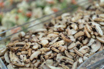 frozen mushrooms on the counter in the store