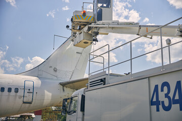 Close up of special machine raising crane upwards
