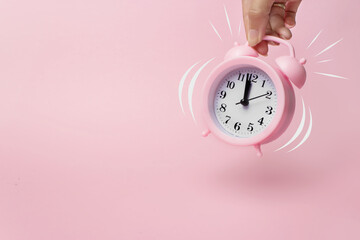 Spring time change concept with alarm clock. The concept of Wake up.