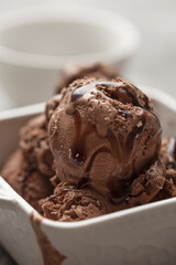 Chocolate ice cream. Ice cream with caramel and chocolate. Close up ice cream