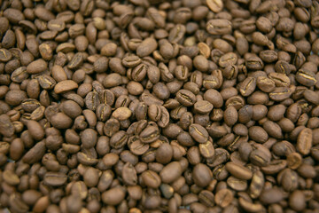 Coffee bean. A mixture of different types of coffee beans. can be used as a background