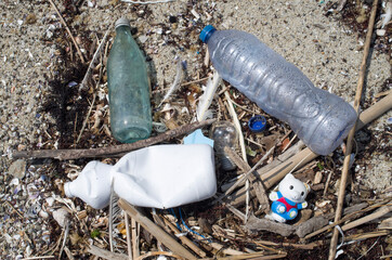 Garbage dumped on the beach closeup