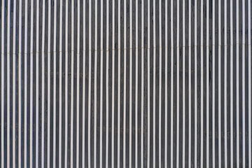 Background in the form of smooth vertical metal lines