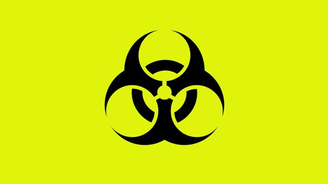 The biohazard sign pulsates and rotates. Seamless animation. On a yellow BG.