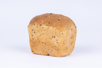 a small loaf of fresh crunchy wheat bread on a white background