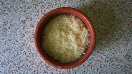 Grated cheese in bowl
