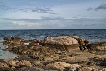 smooth rocks and emerald sea at Koh Nang Yuan at Koh Tao, Thailand