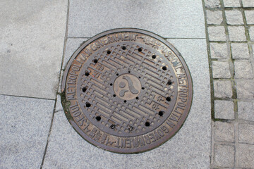 manhole cap in korea - Rusty, grunge manhole cover, round edge