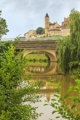 Summer city landscape - view of the bridges over the River Gers in the town of Auch, in the historical province Gascony, the region of Occitanie of southwestern France