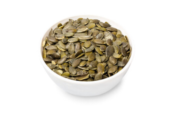 Bowl with pumpkin seeds isolated on white background