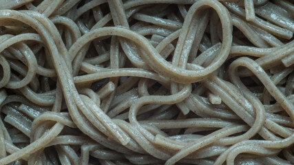 Japanese soba noodle in full screen. Buckwheat noodle of Japan. Close up - obrazy, fototapety, plakaty