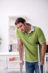 Young man waiting for doctor in the clinic