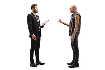 Businessman holding a clipboard and talking to a punk rocker guy