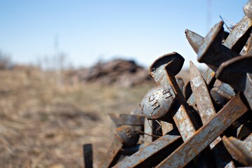 Railroad spikes pile on prairie