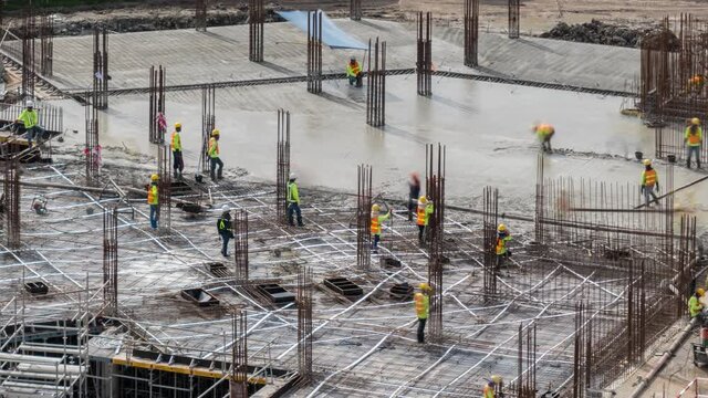 Time lapse construction site.Workers are building real estate in a downtown business.