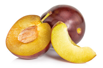 plums and a slice of plum isolated on white background