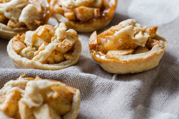 Apple pies on kitchen towel - mini apple tartlets