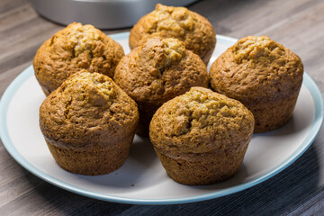Muffins in plate on kithen counter top