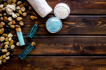 Obraz na płótnie Canvas Spa treatments set with sea cosmetics - salt and aroma oil. Top view