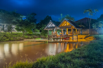 Fototapeta premium Accommodation by the evening water